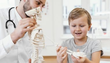 close up doctor kid with skeleton 1024xauto Dadsbanter