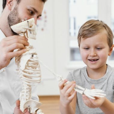 close up doctor kid with skeleton 1024xauto Dadsbanter