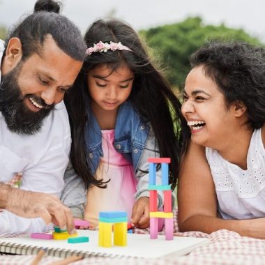 indian parents having fun city park playing with wood toys with their daughter 1160x729 1024xauto Dadsbanter